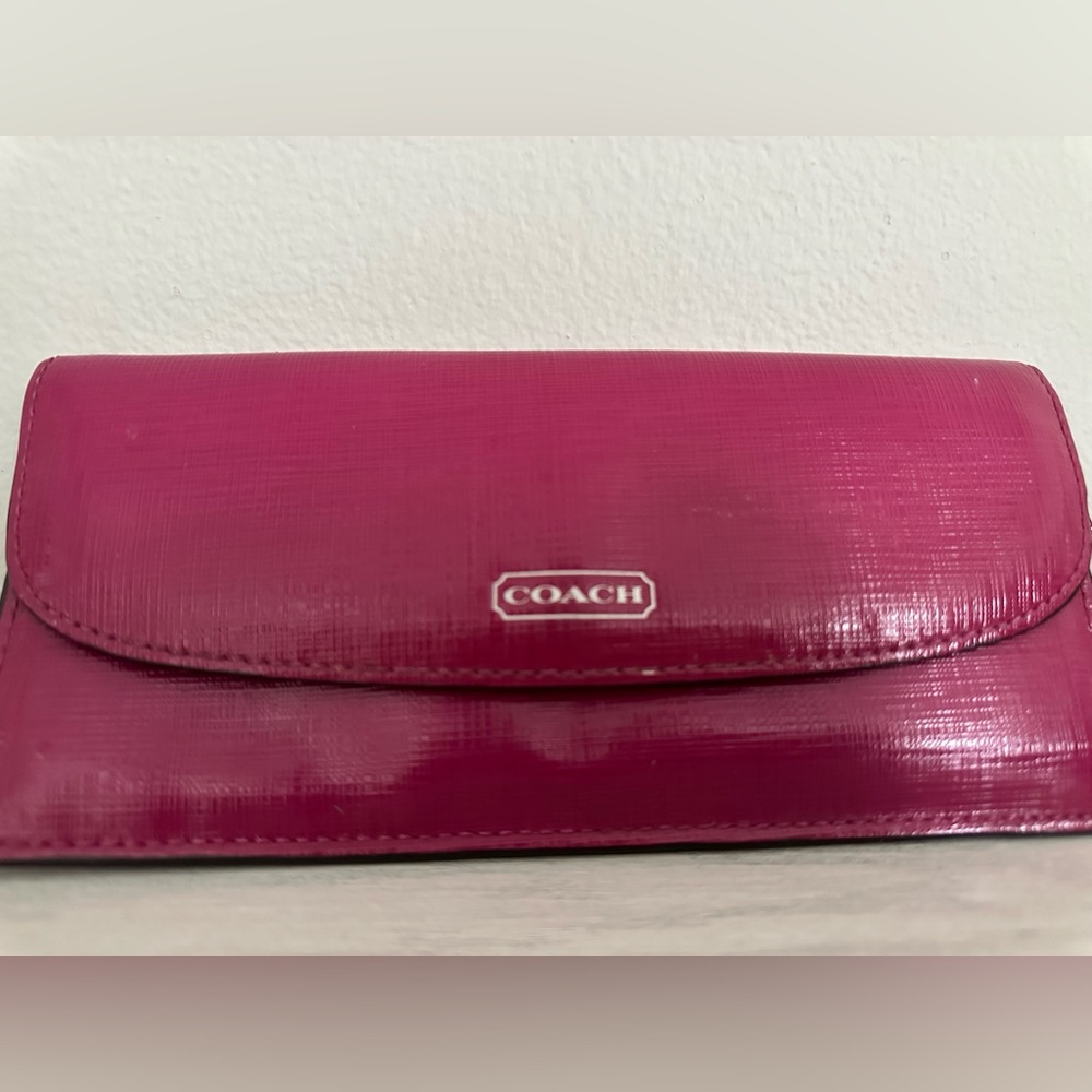 Hot Pink Coach wallet.